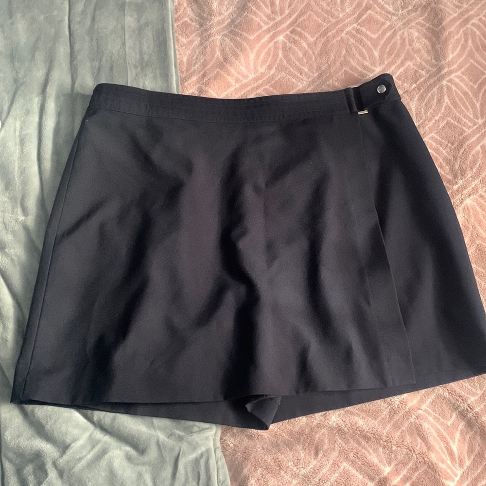 Skort, adorable navy blue with a little silver accent to add. Size 15.